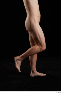 Trent  1 calf flexing nude side view 0003.jpg